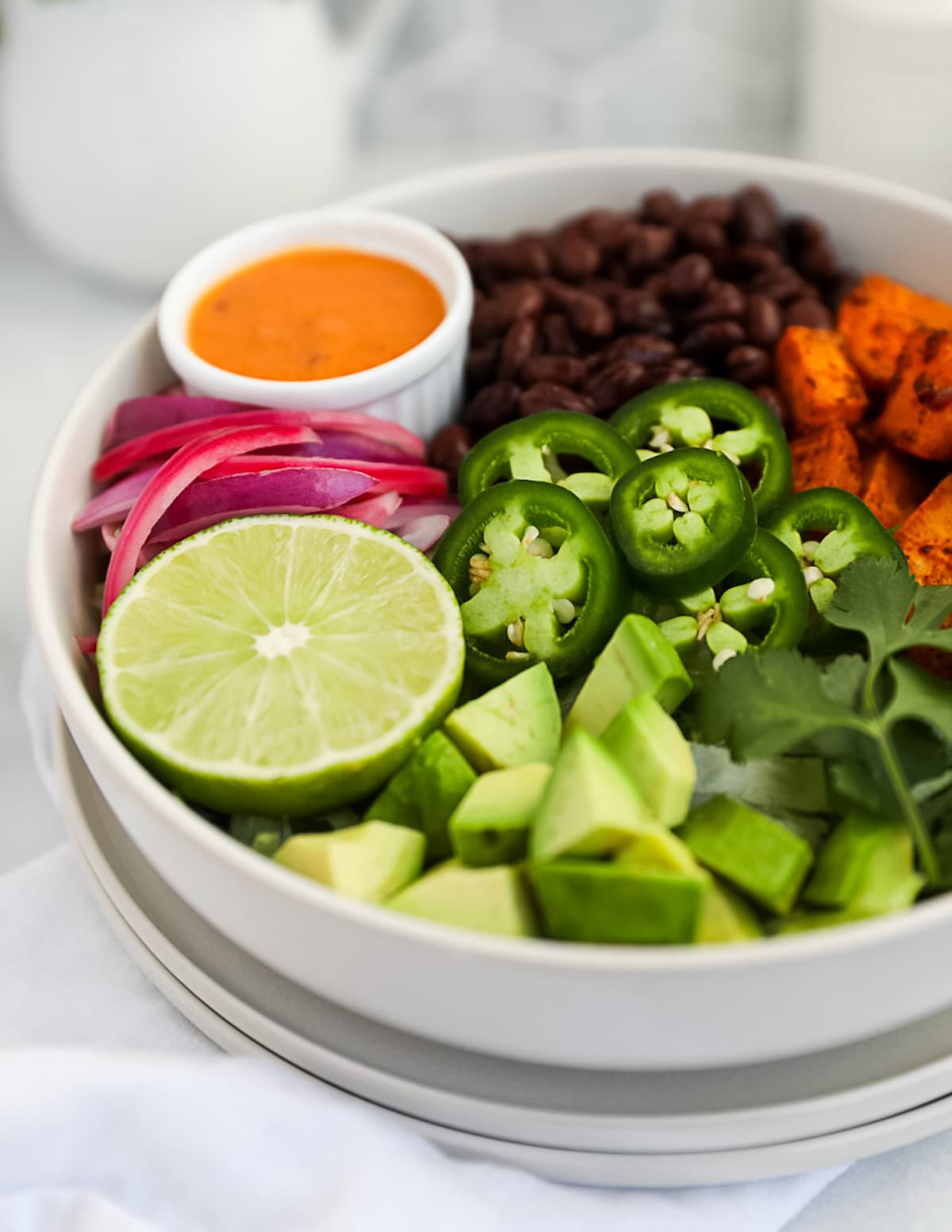 A close up image of a vegetarian burrito bowl
