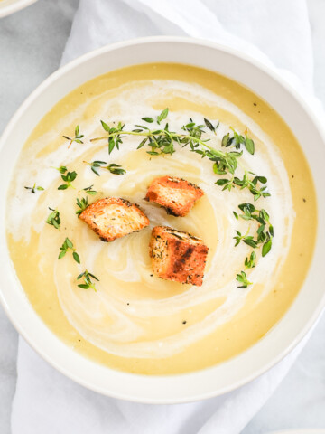A bowl filled with vegan potato leek soup