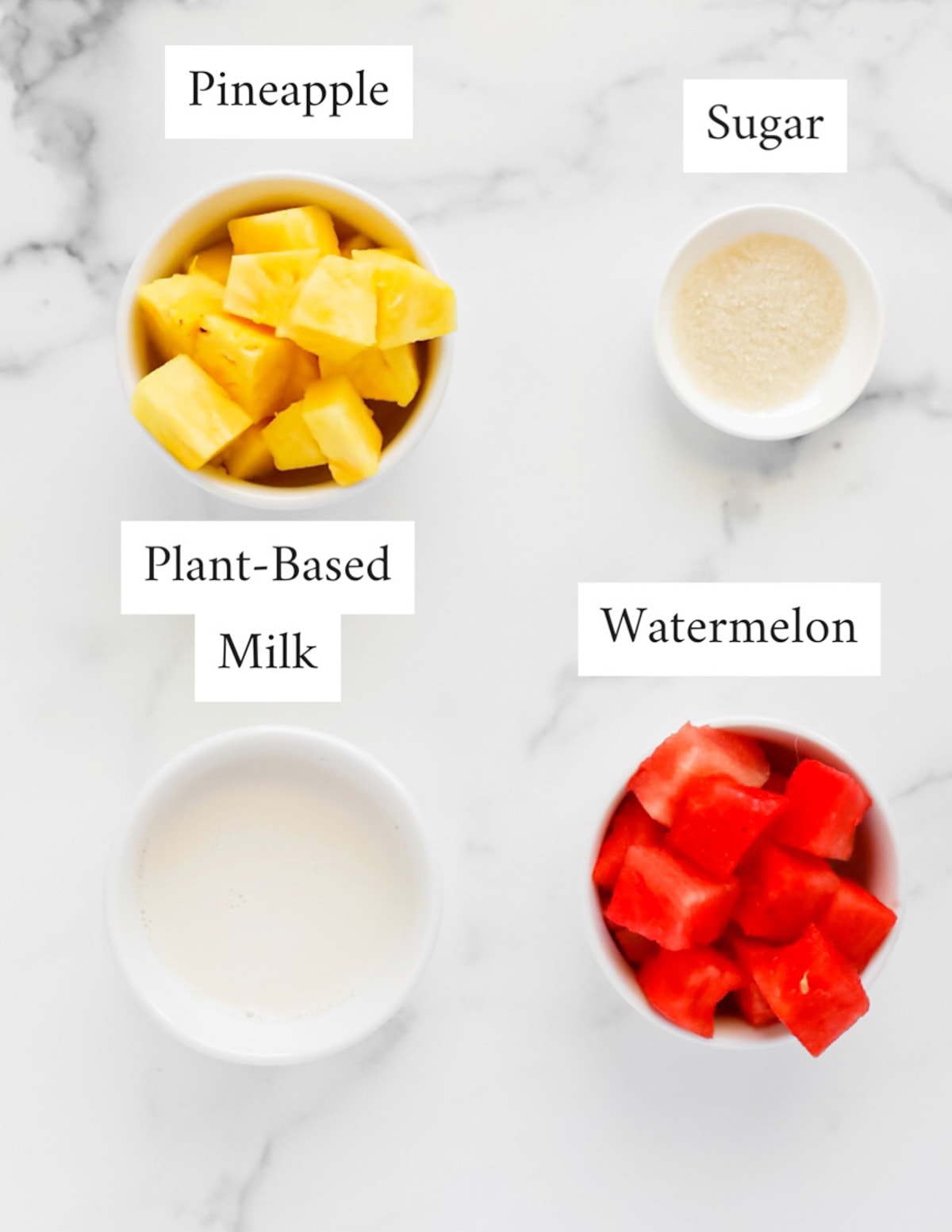 Labeled ingredients including: pineapple, sugar, plant-based milk, watermelon